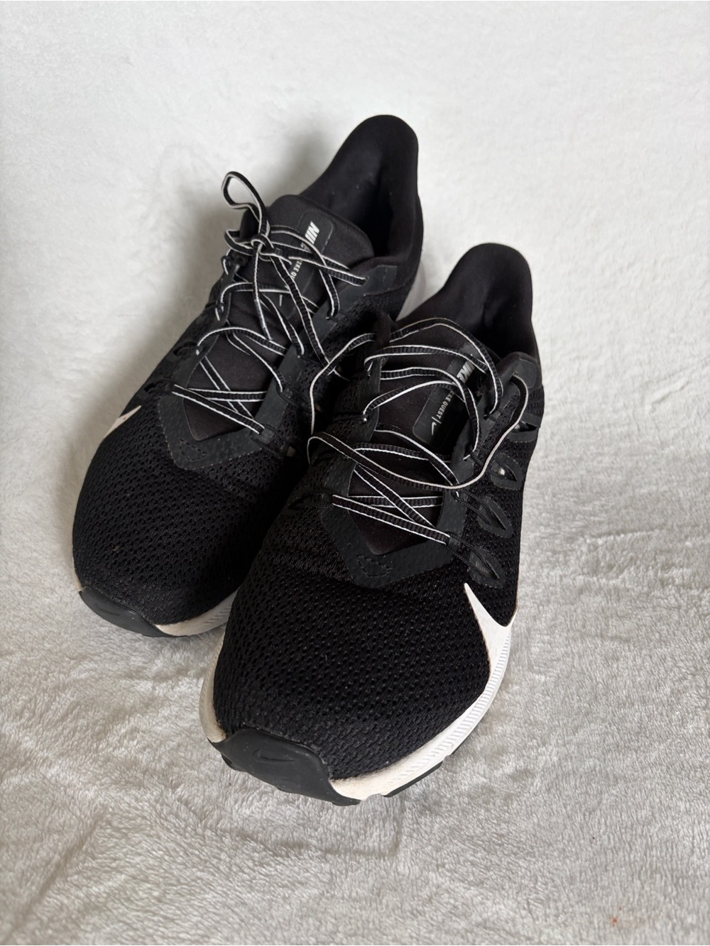 Nike women’s Black Athletic Shoes with White Swoosh
